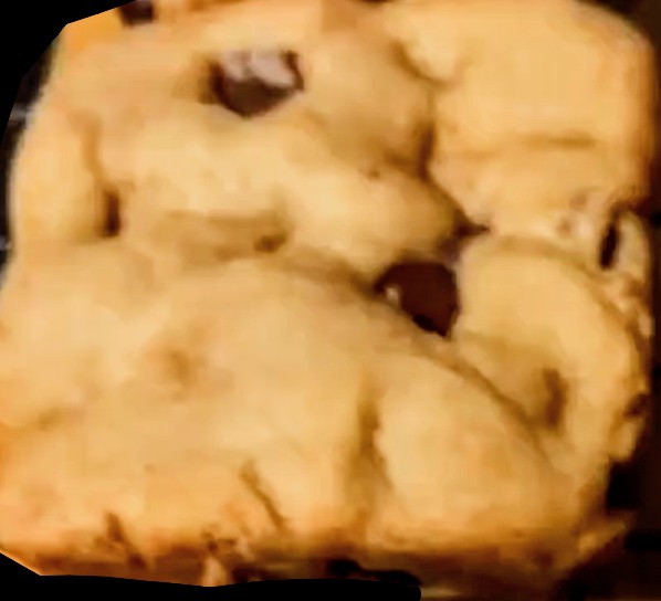 Close-up of a golden chocolate chip cookie